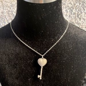 Swarovski closed heart key necklace. Previously owned.